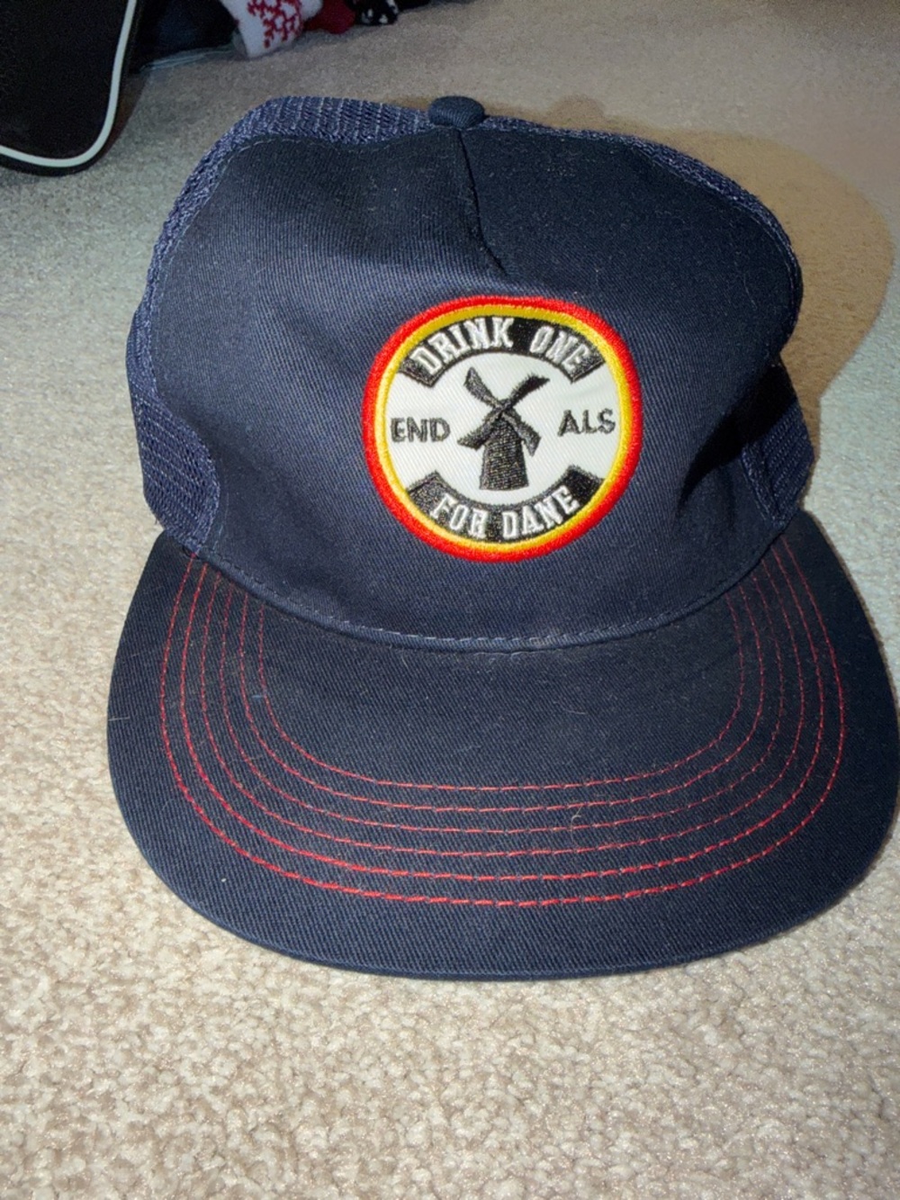 Navy Dutch Bros Drink One For Dane Trucker Hat